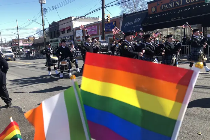 Rainbow flags along the Staten Island St. Patrick's Day parade route on Forest Avenue.